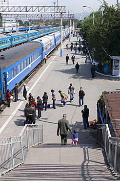 Railway station with passengers and trains, Almaty, Kazakhstan, Central Asia, Asia