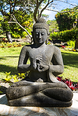 Buddhist statues in the Botanical gardens in Nevis island, St. Kitts and Nevis, Caribbean