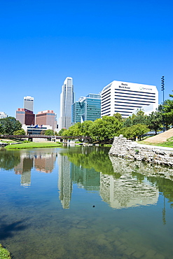 City park lagoon with downtown Omaha, Nebraska, United States of America, North America