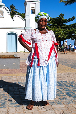 Traditional Bahia dressed woman in Praia do Forte, Bahia, Brazil, South America