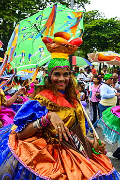 Colourfully dressed woman on the Carneval in Santo Domingo, Dominican Republic, West Indies, Caribbean, Central America