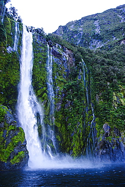 Huge waterfall in Milford Sound, Fiordland National Park, UNESCO World Heritage Site, South Island, New Zealand, Pacific