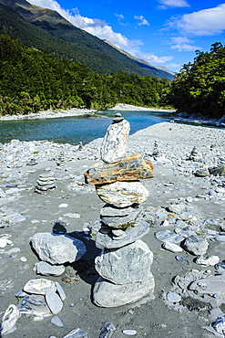 Man made stone pyramids at the Blue Pools, Haast Pass, South Island, New Zealand, Pacific