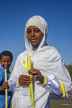 Orthodox girl praying at the Easter ceremony, Coptic Cathedral St. Mariam, Asmara, capital of Eritrea, Africa