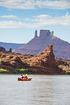 Couple kayaking  down the Colorado River, Castle Valley near Moab, Utah, United States of America, North America