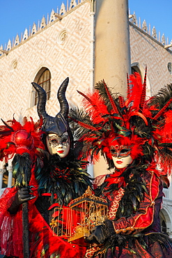 Masks at the Venice Carnival in St. Mark's Square, Venice, Veneto, Italy, Europe