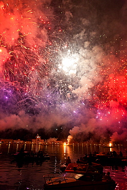 The amazing fireworks display during the night of Redentore celebration in the basin of St. Mark, Venice, Veneto, Italy, Europe