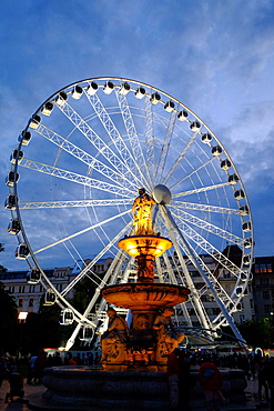 Ferris wheel and the fountain at Erzsebet Square, Budapest, Hungary, Europe