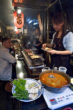 1940s era Omoide Yokocho (Memory Lane) restaurant alley district in Shinjuku, Tokyo, Japan, Asia