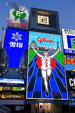 Famous neon wall with Glico runner advert in Dotonbori district of Namba, Osaka, Japan, Asia