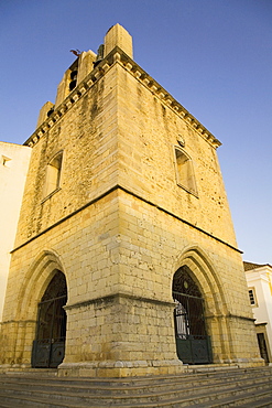 The fortress like stone tower of medieval Faro Cathedral (Largo da Se) in Faro, Algarve, Portugal, Europe