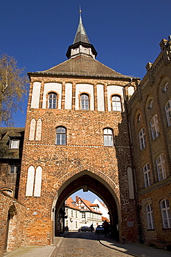 The Kuetertor gateway arches over the street in Stralsund, Mecklenburg-Vorpommern, Germany, Europe