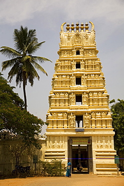 Gopuram of the ancient Dravidinian style Lakshmi Ramana Swami temple within the grounds of Amba Vilas Palace in Mysore, India, Asia