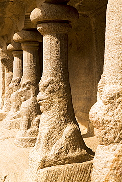 Stone pillars support the Bhima Ratha in the Five Rathas (Panch Rathas) complex at Mahabalipuram (Mamallapuram), UNESCO World Heritage Site, Tamil Nadu, India, Asia