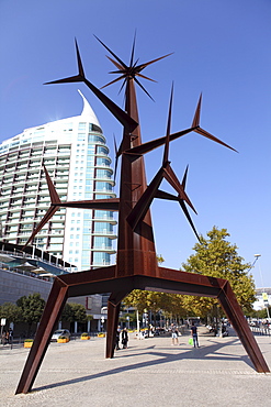 Contemporary iron Sun Man (Homem-Sol) sculpture by Jorge Vieira at the Park of Nations (Parque das Nacoes), in Lisbon, Portugal, Europe