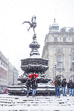 Eros Statue, snow storm, Piccadilly Circus, London, England, United Kingdom, Europe