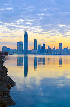 City skyline at dawn, Abu Dhabi, United Arab Emirates, Middle East