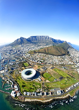 Aerial view of Cape Town showing Table Mountain, with Devil's Peak on the left, Lion's Head and Signal Hill on right, and the new Green Point stadium and suburb of Mouille Point in the foreround, Cape Town, South Africa, Africa