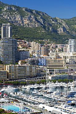 View of yachts and sailing boats in Port Hercule in the independant Principality of Monaco, Cote d'Azur, French Riviera, Mediterranean, Europe