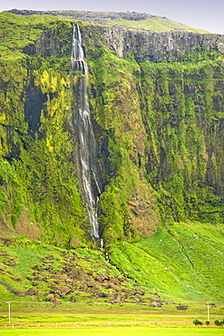 Waterfall and escarpment just east of Seljalandsfoss in the southwest, Iceland, Polar Regions