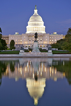 The U.S. Capitol building reflected in the Reflecting Pool in Washington D.C., United States of America, North America