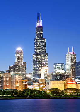 Dusk view of the city skyline including the 110-storey Willis Tower, formerly known as the Sears Tower, Chicago, Illinois, United States of America, North America