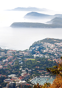 View from Mount Srd over part of the city of Dubrovnik and islands in the Adriatic Sea, Croatia, Europe