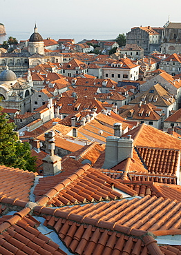 View over the rooftops of the old town in the city of Dubrovnik, UNESCO World Heritage Site, with Lokrum Island beyond, Adriatic Coast, Croatia, Europe