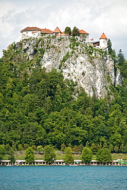 Bled Castle on a rocky promontory overlooking Lake Bled in the Julian Alps in northwest Slovenia, Europe