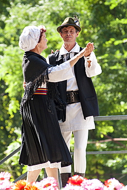 A couple in traditional costume dancing for Limba Noastra (National Language Day) on 31st August, Chisinau, the capital of Moldova, Europe