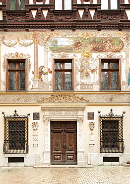 Mural and architectural detail in the courtyard of Peles Castle in Sinaia in the Carpathian mountains in the Transylvania region of central Romania, Europe