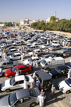 Second-hand vehicles for sale at the Friday souk in Nizwa in Oman.