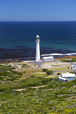 Slangkop point lighthouse on the Atlantic coast of the Cape Peninsula near Cape Town in South Africa.