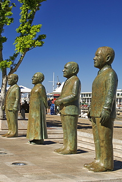 Statues of South Africa's four Nobel Peace prize laureates in the waterfront in Cape Town South Africa. From left to right: Albert Luthuli, Bishop Desmond Tutu, FW De Klerk and Nelson Mandela.