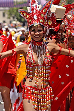 A girl in colourful costume taking part in the annual Minstrels parade (also referred to as the Coon Carnival) in Cape Town.