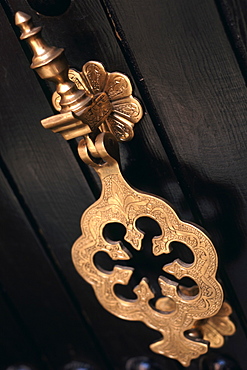 Ornate door knocker on a door in the medina in Marrakech, Morocco