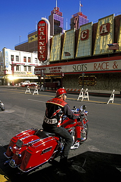 Harley Davidson biker on Virgina Street, Reno, Nevada, UsaHarley Davidson biker on Virgina St in Reno, the glitzy little Las Vegas-style gambling city in the far west