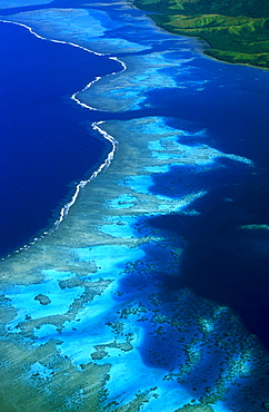 Aerial view of surf breaking on the windward side of coral reef off the south coast of Vanua Levu, FijiFiji's second biggest island