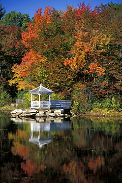 Gazebo and autumn colours, part of the beautiful 
New England fall display, at Ice House Pond (a.k.a 'Golden Pond', but not the same one as in the film) at Hopkinton in October, Massachusetts, United States of America