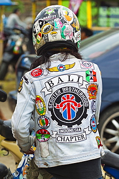 Man in jacket with patches at scooter enthusiast's meet in this south coast resort town, Pangandaran, West Java, Java, Indonesia, Southeast Asia, Asia