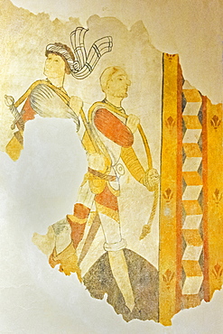 A 15th century fresco of armed men in St. Eutrope church in the historic village on the River Dropt, Allemans-du-Dropt, Lot-et-Garonne, France, Europe