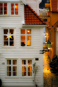 House looking hygge (cosy) with Nordic Christmas star lanterns on Tvedtegarden, Sliberget Street. Bergen, Hordaland, Norway, Scandinavia, Euruope