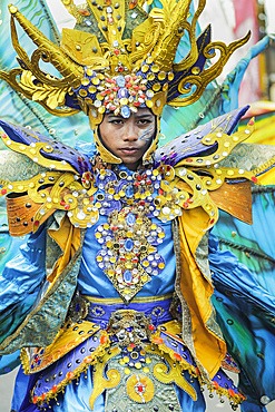 Young man in elaborate costume at the annual Tomohon International Flower Festival parade, Tomohon, North Sulawesi, Sulawesi, Indonesia, Southeast Asia, Asia