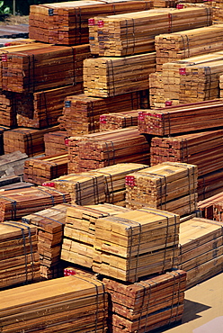 Piles of timber at Beaufort train station, from primary rain forest which has been logged out, north of Borneo, Sabah, Malaysia, Southeast Asia, Asia