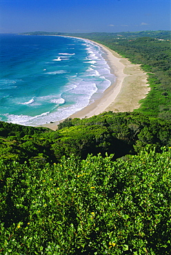 Tallow Beach from Cape Byron, a popular surfing spot east of the resort of Byron Bay in north east NSW, New South Wales, Australia