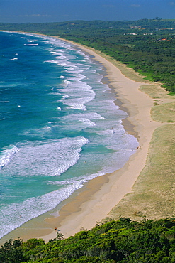 Tallow Beach from Cape Byron, a popular surfing spot east of the resort of Byron Bay in north east NSW, New South Wales, Australia