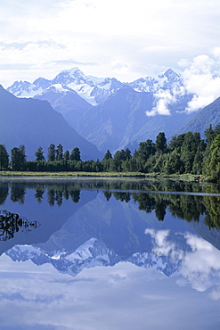 Mountains of the Southern Alps reflected in Lake Matheson, Canterbury, South Island, New Zealand, Pacific