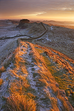 Sunrise on Hadrian's Wall National Trail in winter, looking to Housesteads Fort, Hadrian's Wall, UNESCO World Heritage Site, Northumberland, England, United Kingdom, Europe