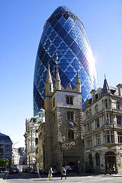 30 St Mary Axe (The Gherkin) with St. Andrew Undershaft church, City of London, England, United Kingdom, Europe