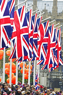 Union flags and spectators outside Houses of Parliament, during the marriage of Prince William to Kate Middleton, 29th April 2011, London, England, United Kingdom, Europe